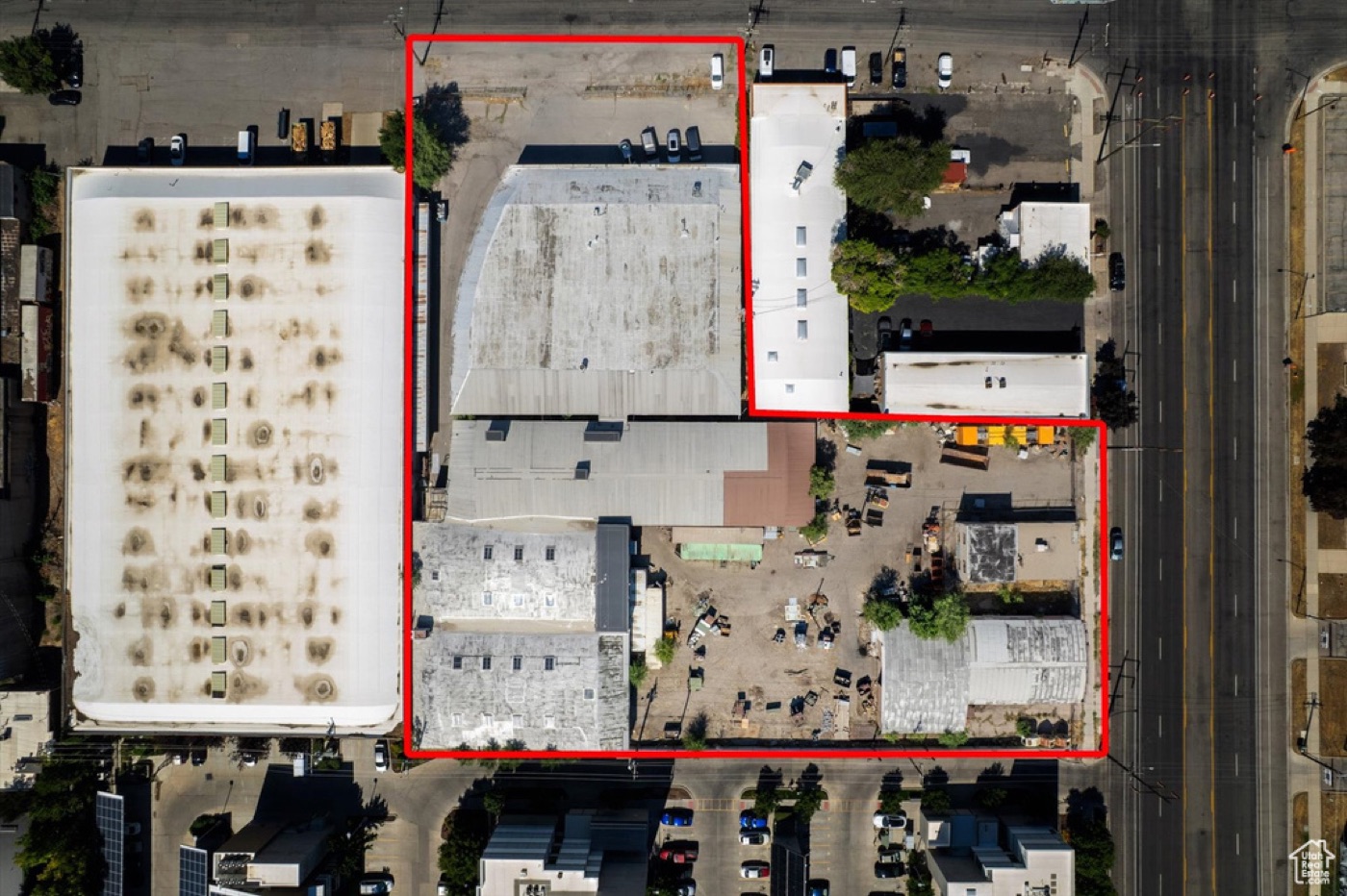 Overhead aerial photo of the two parcels with the property line outlined